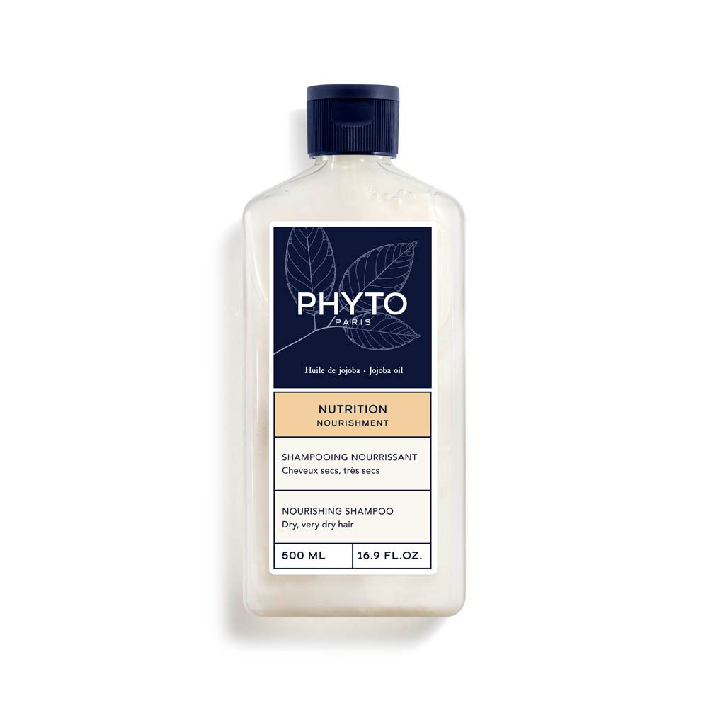 Shampoo fles. Wit etiket met blauw logo en tekst. Bevat jojoba-olie. 500 ml. Voor droog, zeer droog haar.