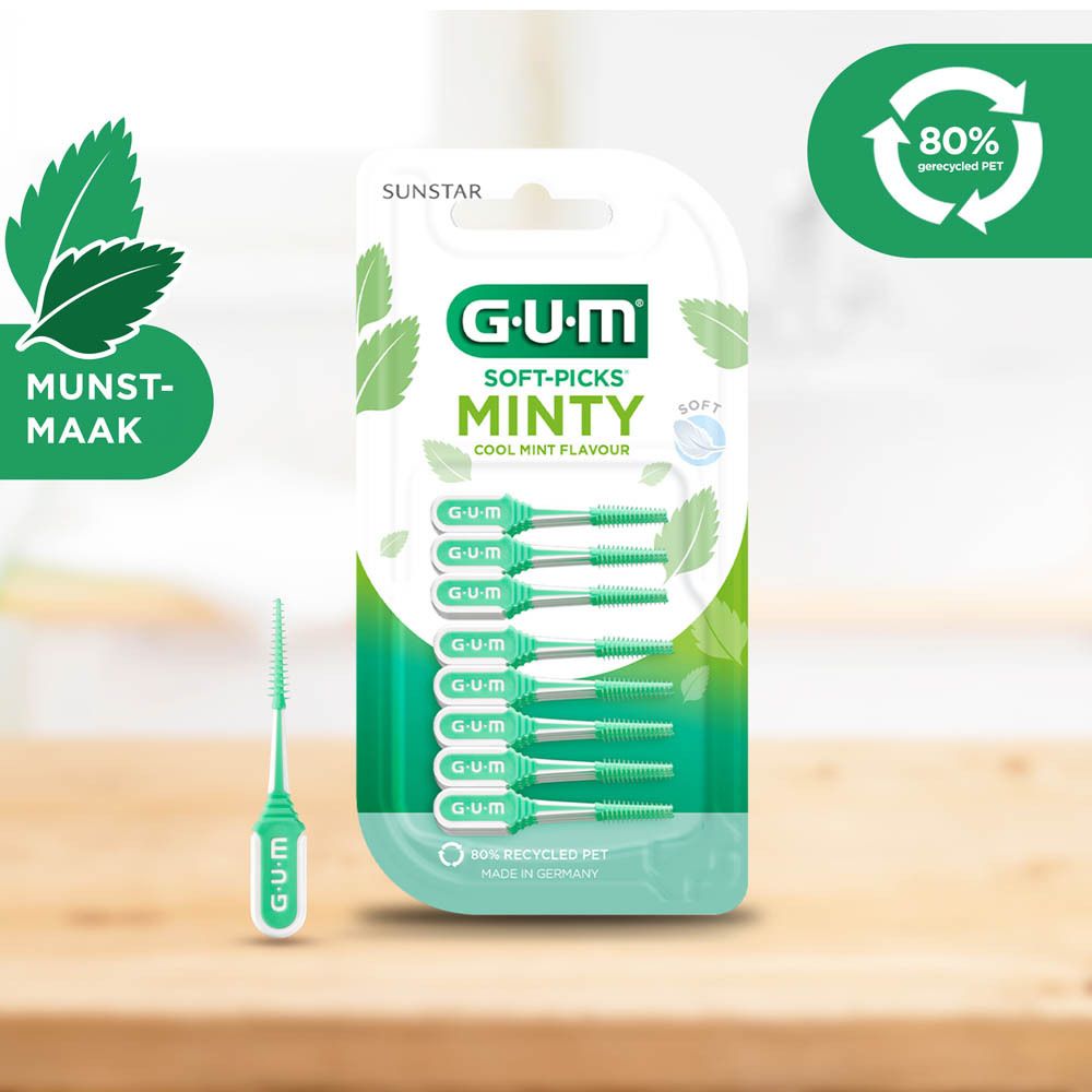 GUM Soft-Picks Minty verpakking met een tandenstoker. Groen-wit ontwerp. Bevat 40 stuks. Muntsmaak.