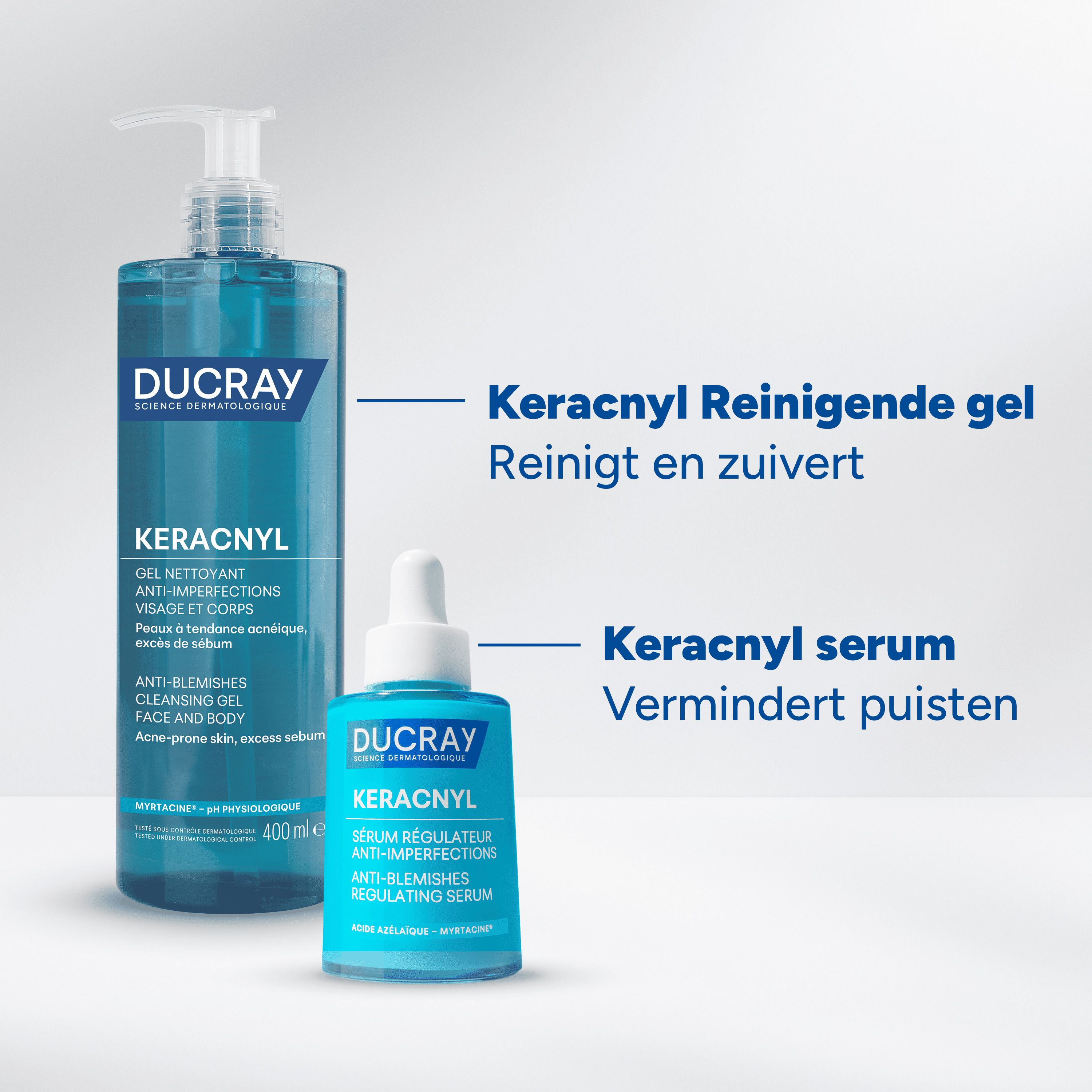 Achterkant van het blauwe serumflesje. Meertalige tekst. Opschrift: Ducray Keracnyl.