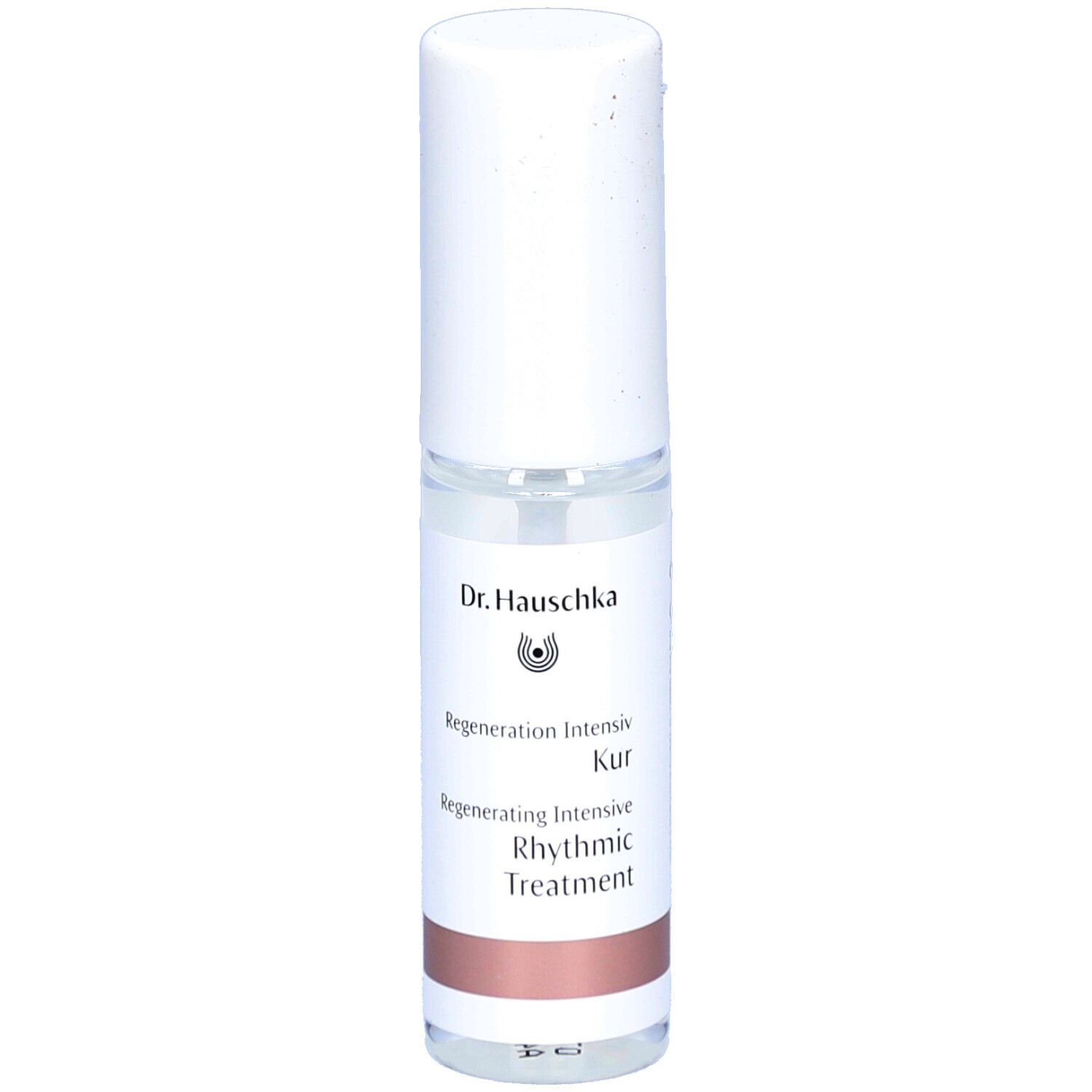 Flacon cylindrique blanc. Inscriptions: Dr. Hauschka, Regeneration Intensiv Kur, Rhythmic Treatment.