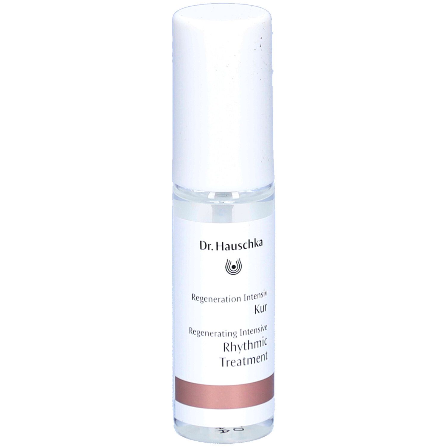 Flacon cylindrique blanc. Inscriptions: Dr. Hauschka, Regeneration Intensiv Kur, Rhythmic Treatment.