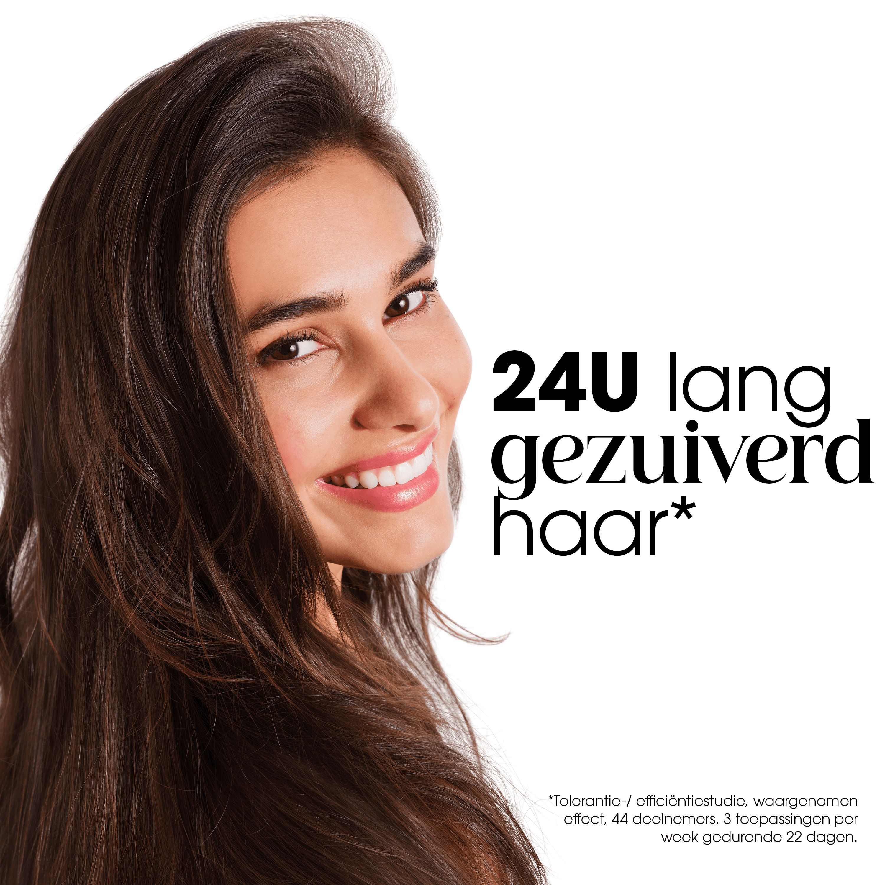 Vrouw met glanzend haar. Tekst: 24U lang gezuiverd haar.