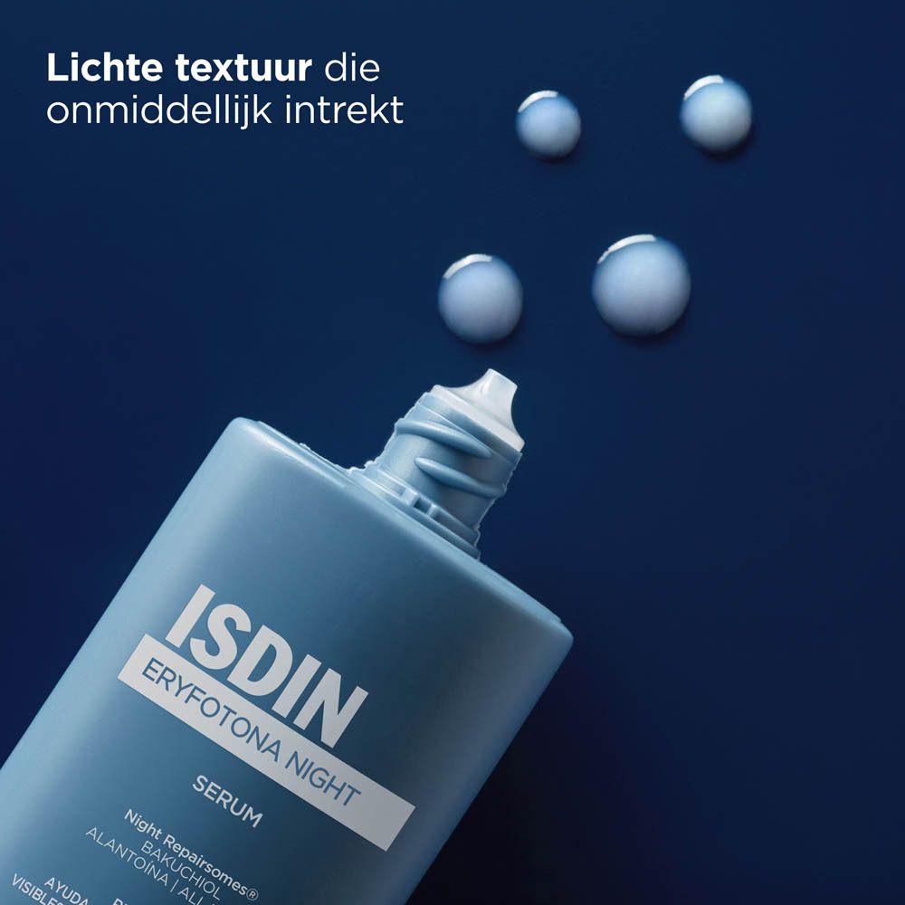 ISDIN Eryfotona Night Serum en druppels. Blauwe fles. Druppels ernaast.