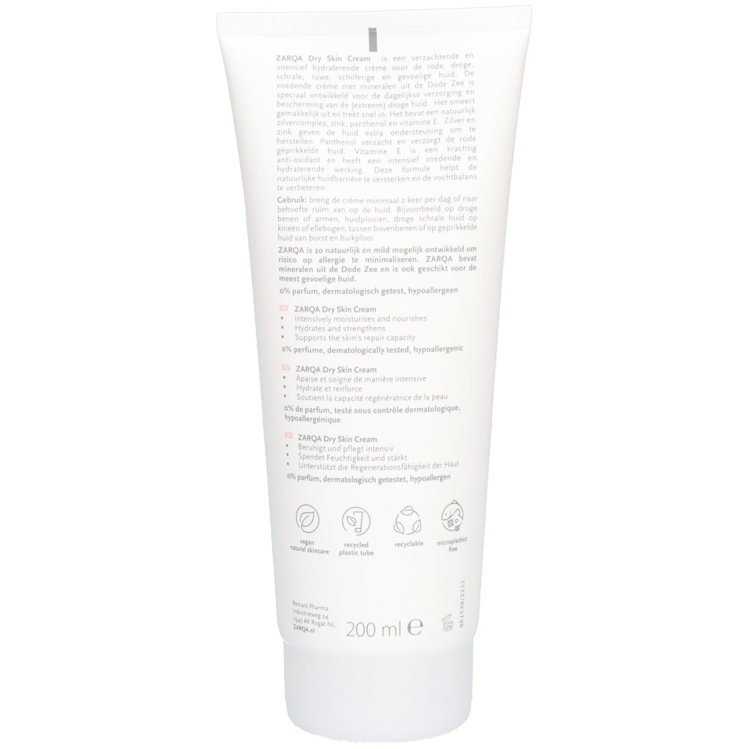 Achterkant van de witte tube. Meertalige tekst. Logo's: Vegan, recyclebaar, dierproefvrij. Volume: 200 ml.