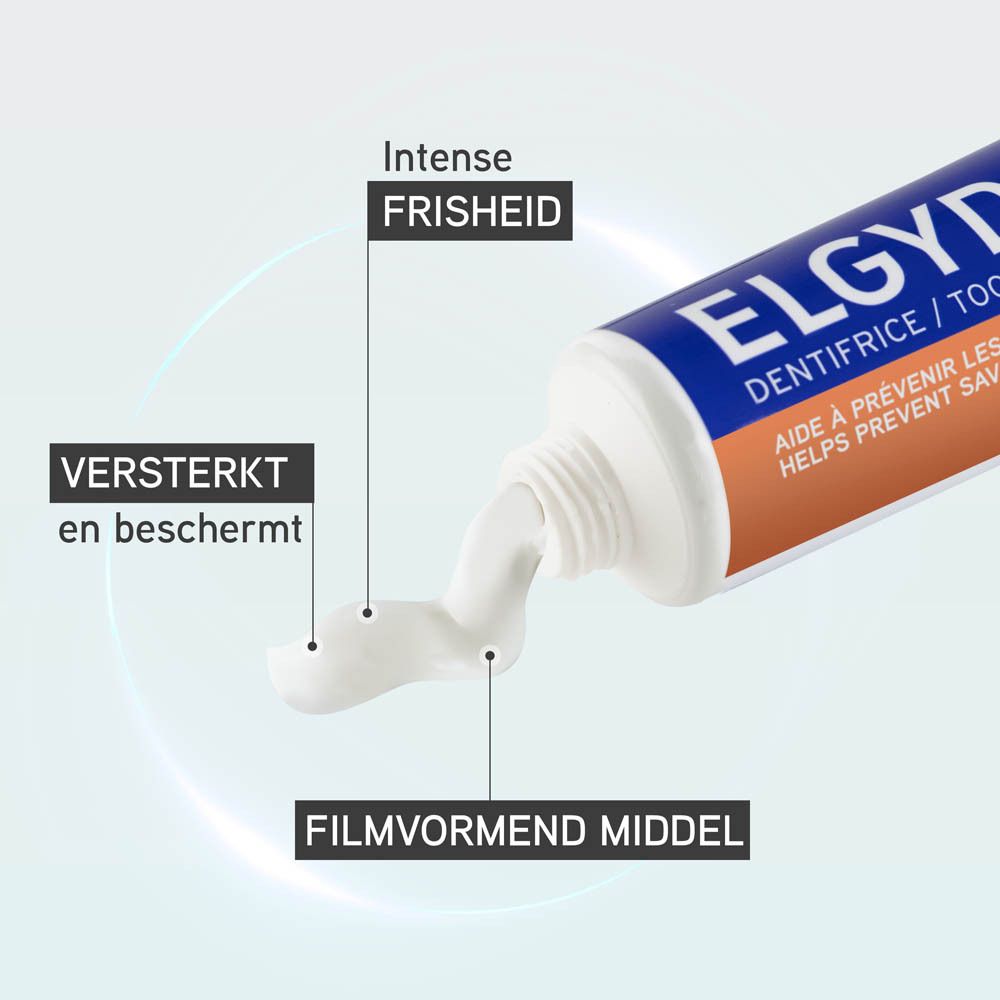 ELGYDIUM tandpasta tube. Wit, blauw en oranje. Productnaam en info.