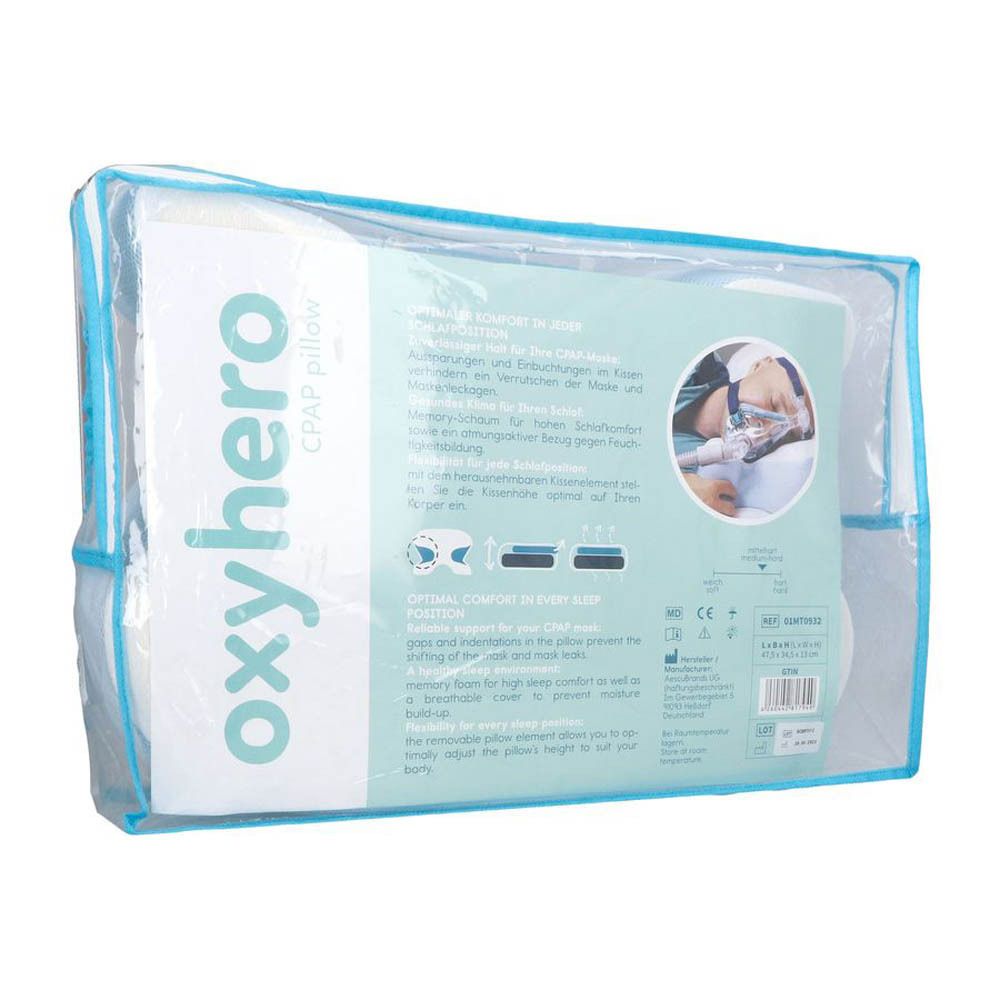 Emballage avec oreiller et informations produit. Texte : Oxyhero CPAP pillow. Illustration d'une personne avec masque.