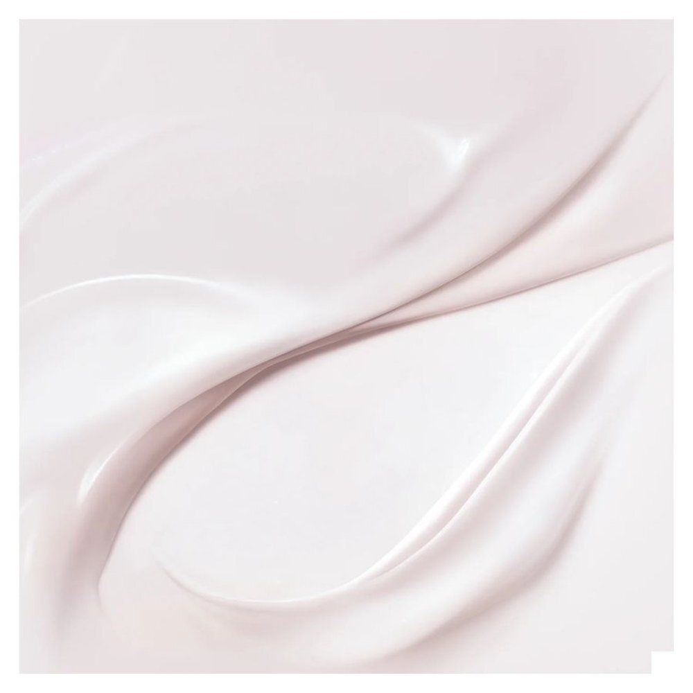Achterkant van de Nuxe Hair Prodigieux leave-in crème tube met ingrediënten en certificeringen.