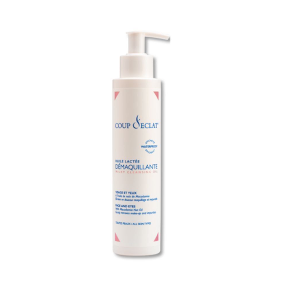 Flacon blanc avec pompe. Inscription: COUP D'ECLAT, HUILE LACTÉE DÉMAQUILLANTE. Pour le visage et les yeux. Waterproof.