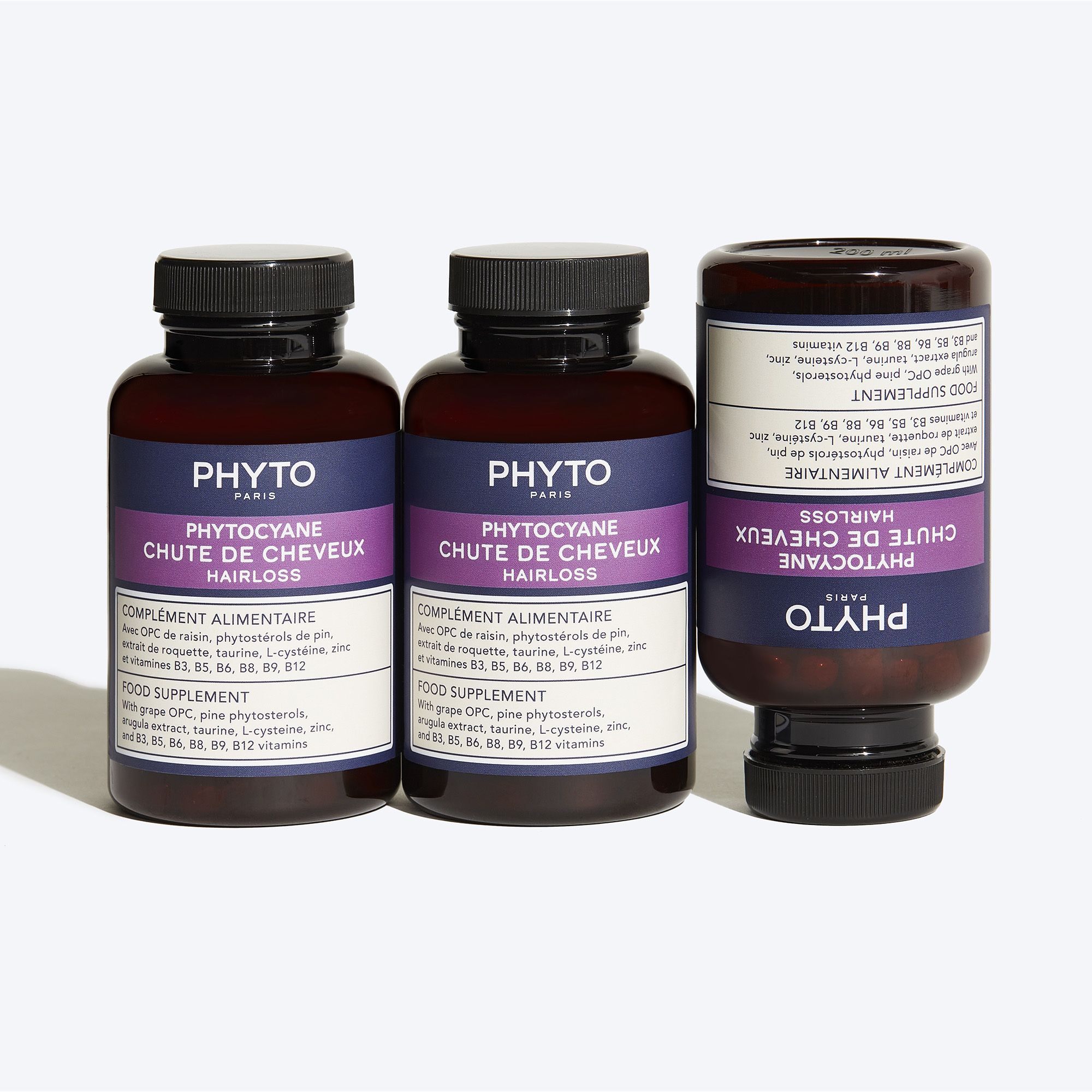 Bruine fles met capsules. Opschrift: Phyto Phytocyane Chute de Cheveux. Voedingssupplement.