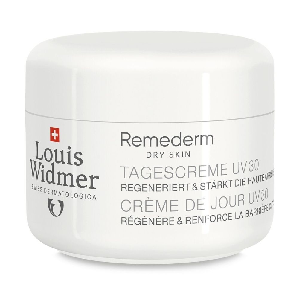 Witte crème pot met Louis Widmer logo en productnaam Remederm Dagcrème UV30. Zwitsers kruis.