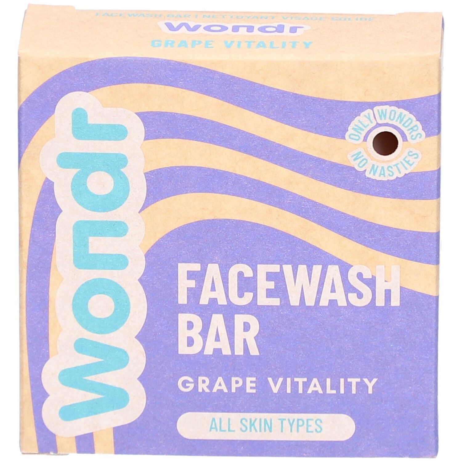 Boîte en carton "Wondr Grape Vitality Facewash Bar". Motif vagues violettes, logo et nom du produit.