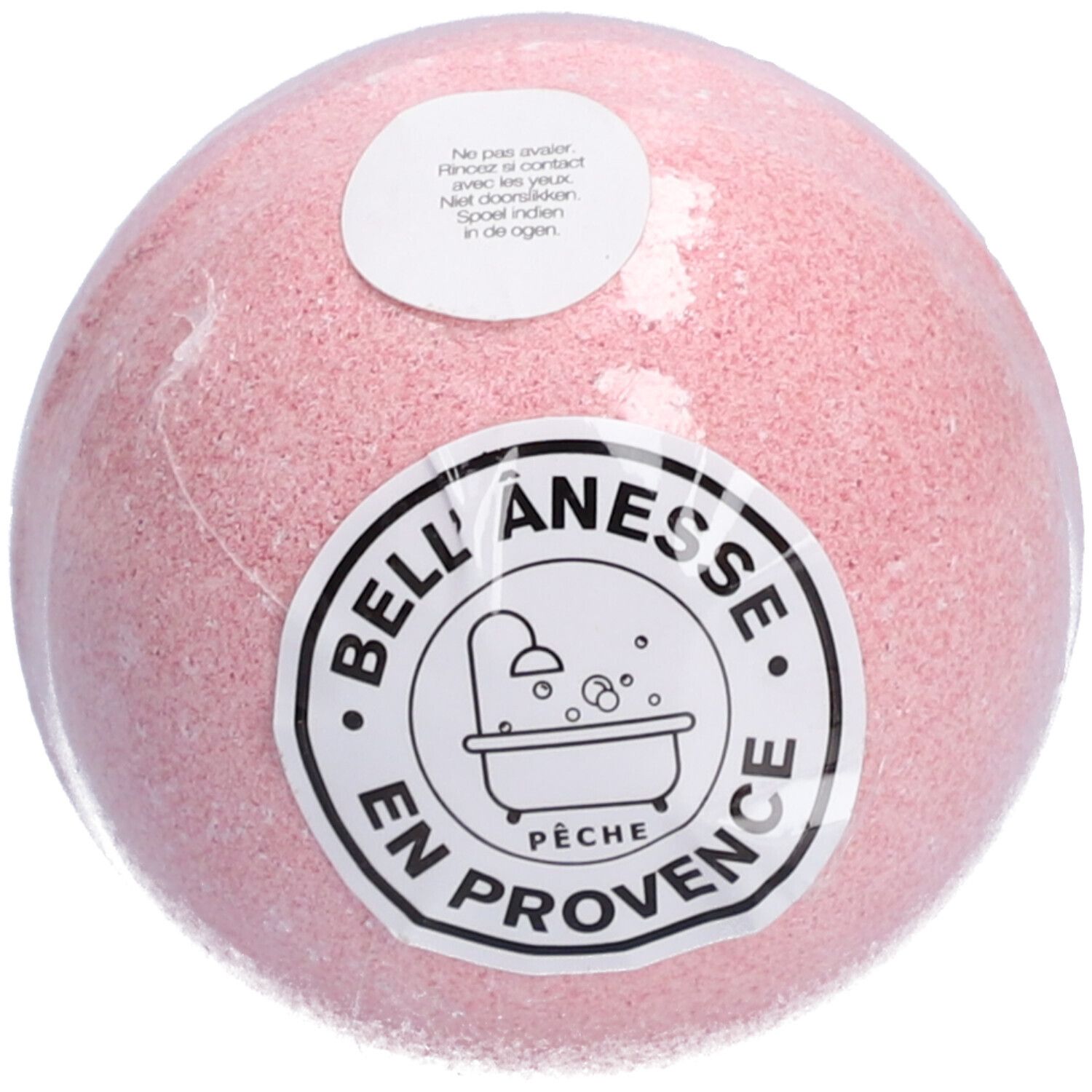 Roze bol, verpakt in transparante plastic folie. Label met tekst en badkuip illustratie. Merk: Bell Ânesse.