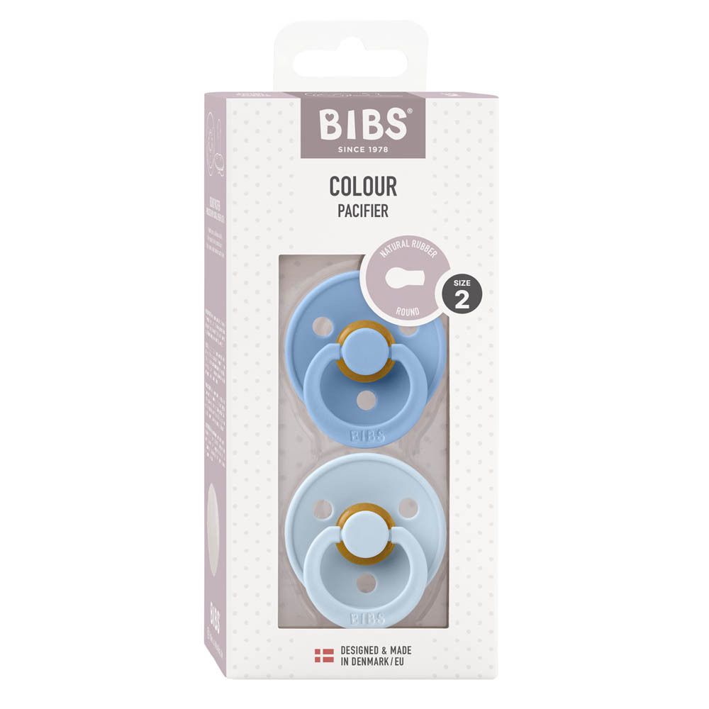 Verpakking met twee babyblauwe fopspenen. Merk BIBS, maat 2, 6+ maanden. Transparant venster.