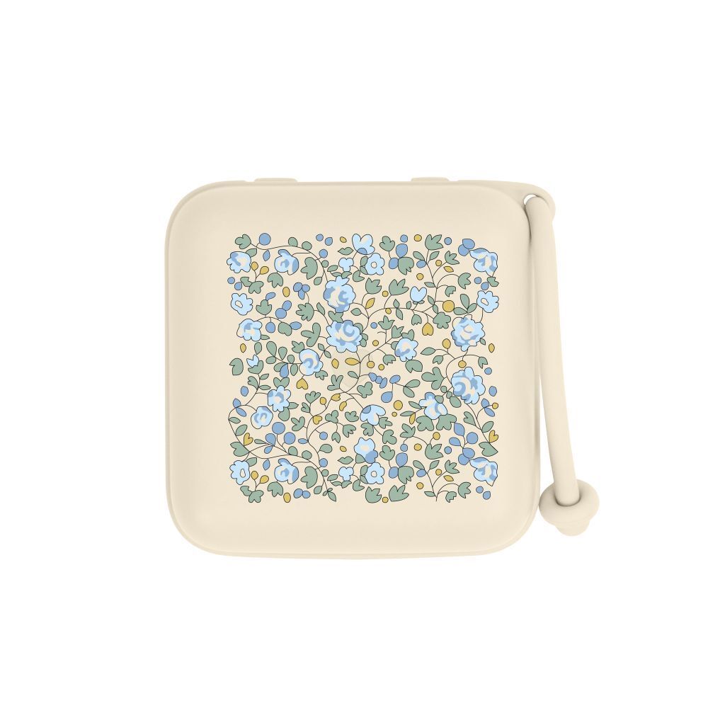 BIBS fopspeenbox. Beige doos met blauw bloemmotief. Deksel met handvat.