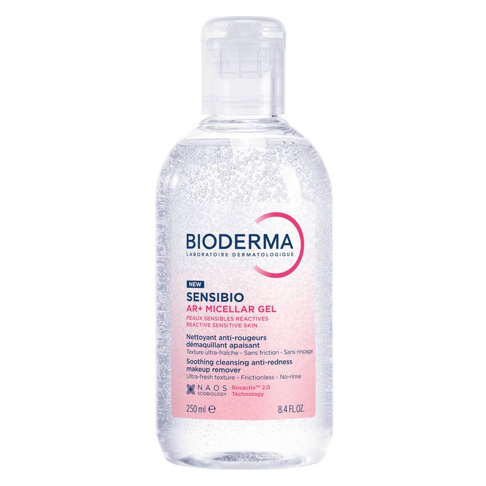 Flacon Bioderma Sensibio AR+ Gel Micellaire. Étiquette rose avec texte. Bouchon blanc.