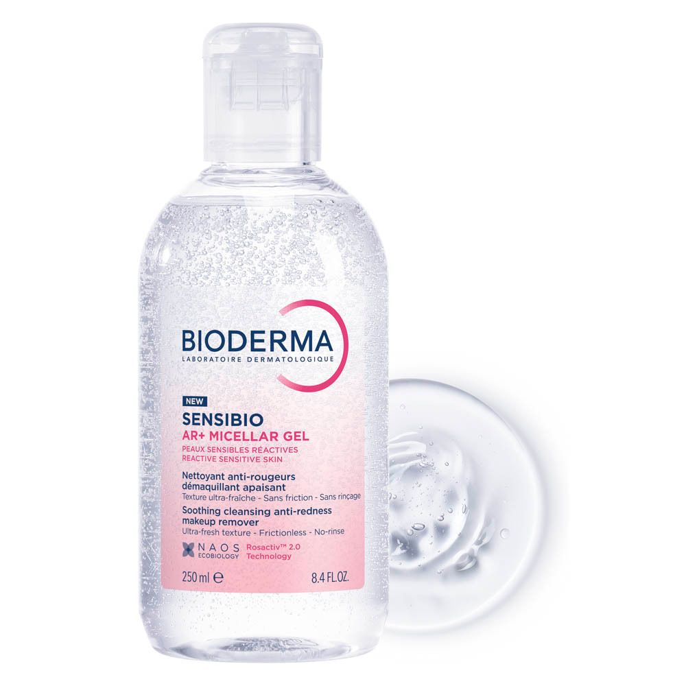Flacon Bioderma Sensibio AR+ Gel Micellaire et goutte de gel. Étiquette rose. Bouchon blanc.