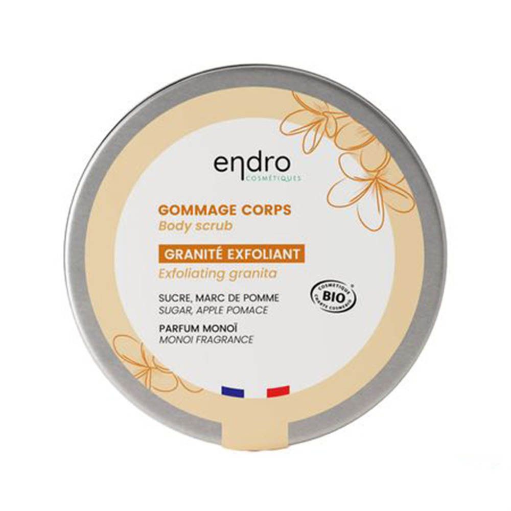 Ronde pot met deksel. Opschrift: Gommage Corps, Granité Exfoliant, Parfum Monoï. Bio-certificering. Endro-logo. Franse vlag.
