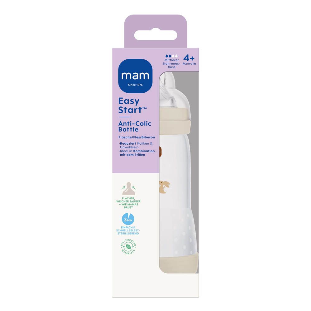 Babyfles met dierenmotief en beige bodem en ring.