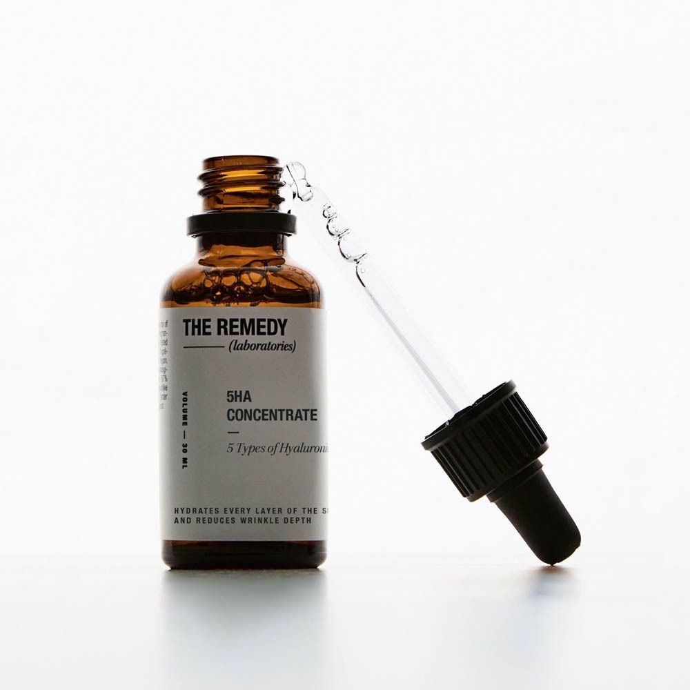 Bruine glazen fles met druppeldop, etiket "THE REMEDY laboratories 5HA CONCENTRATE", 30 ml.