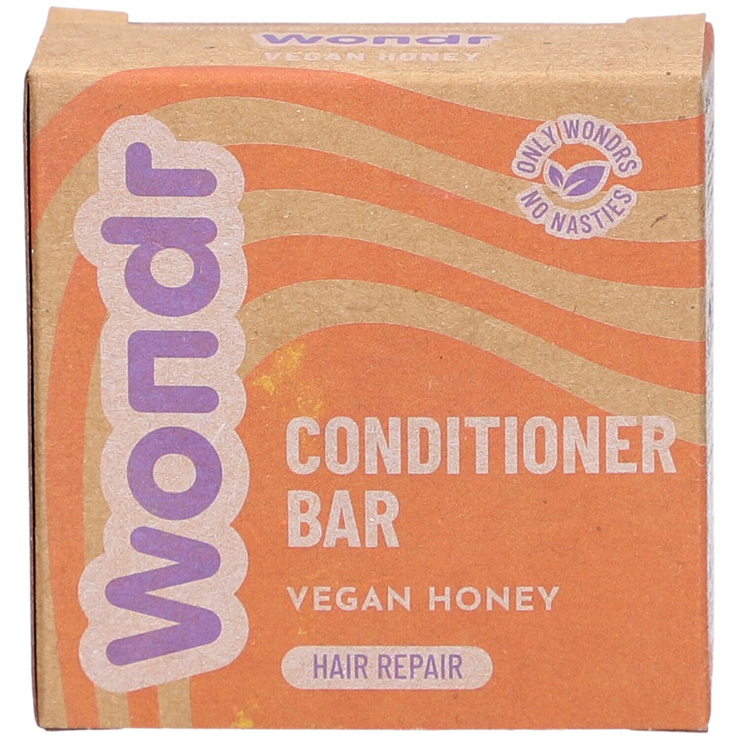 Boîte en carton avec nom et description du produit. Inscription : Wondr Conditioner Bar Vegan Honey Hair Repair.
