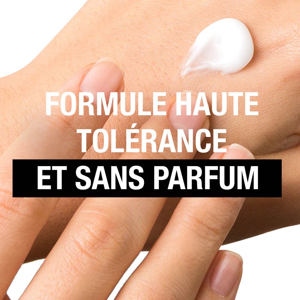 Main avec crème. Texte : Formule haute tolérance et sans parfum.