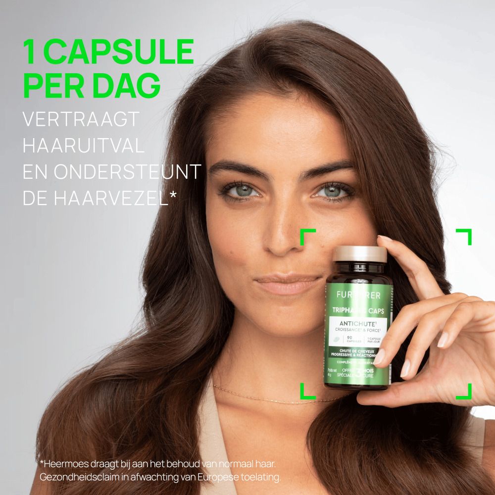Vrouw met flesje. Tekst: 1 capsule per dag. Vertraagt haaruitval en ondersteunt de haarvezel.