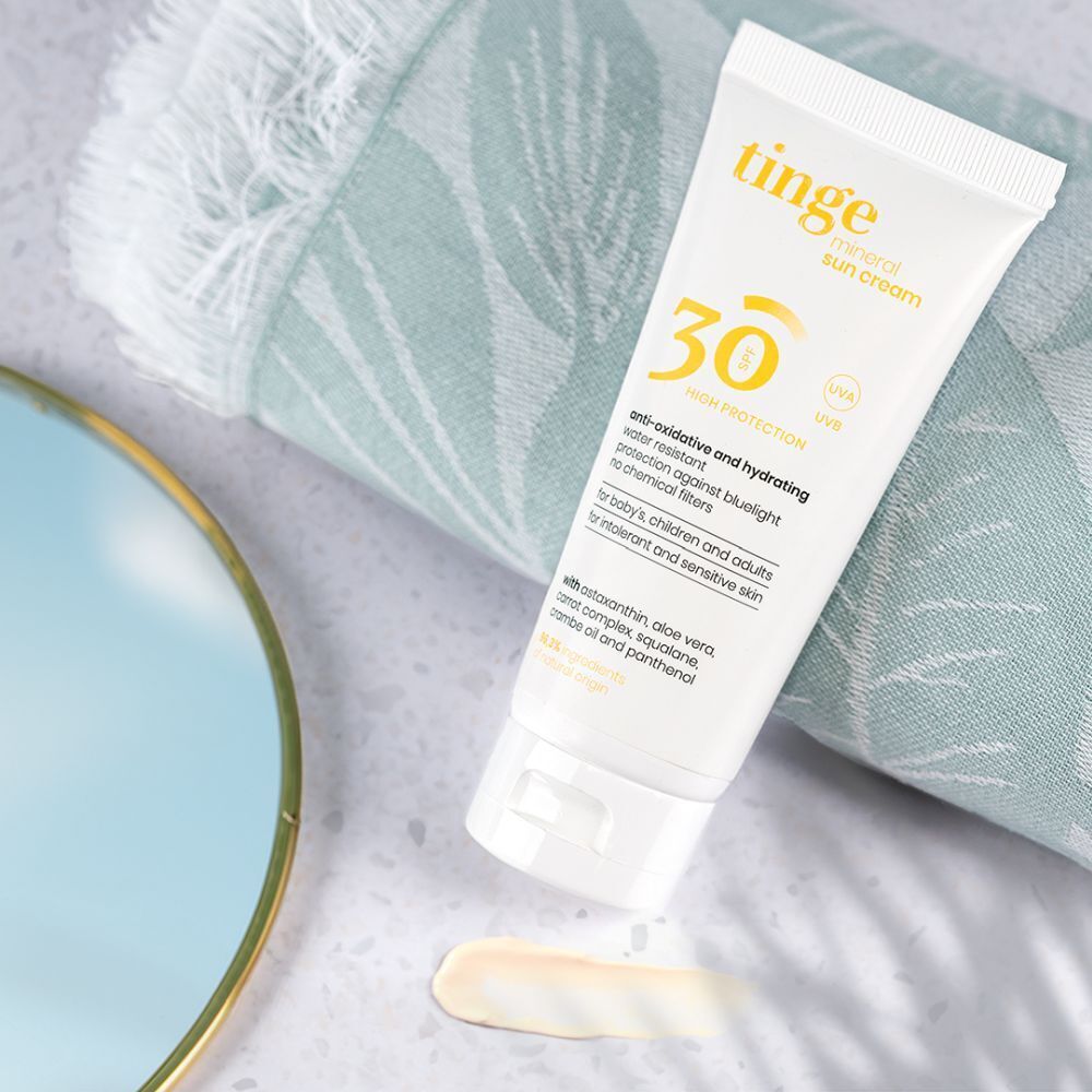 Tinge Mineralische Zonnecrème SPF30 tube en vouwdoos.