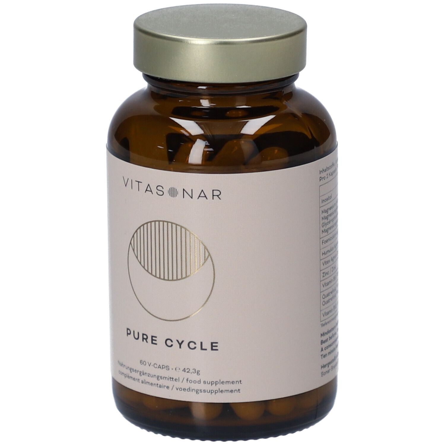 Flacon en verre brun avec bouchon doré. Étiquette avec nom du produit et logo.