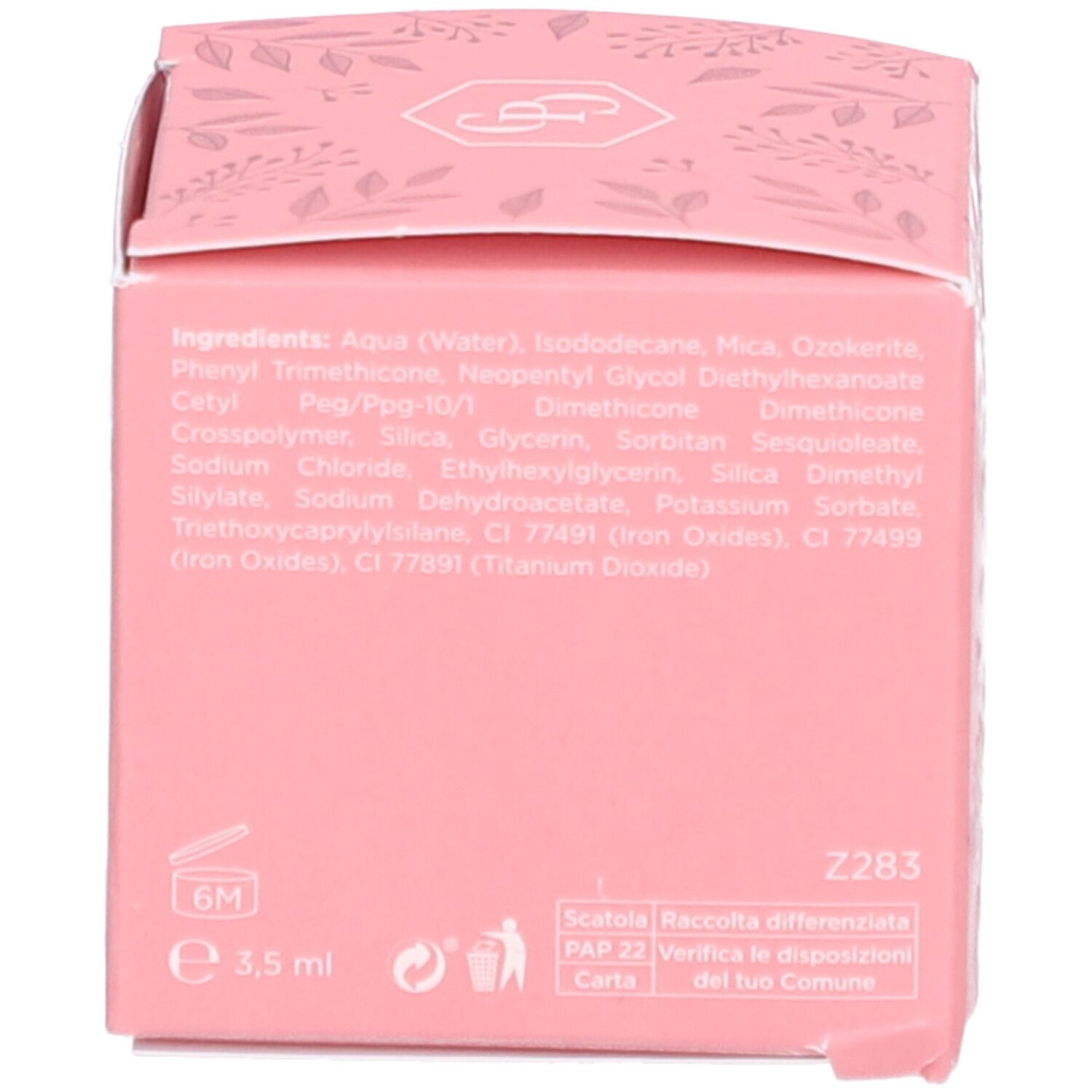 Dos d'une boîte rose. Ingrédients imprimés, symbole de durabilité et informations d'élimination.