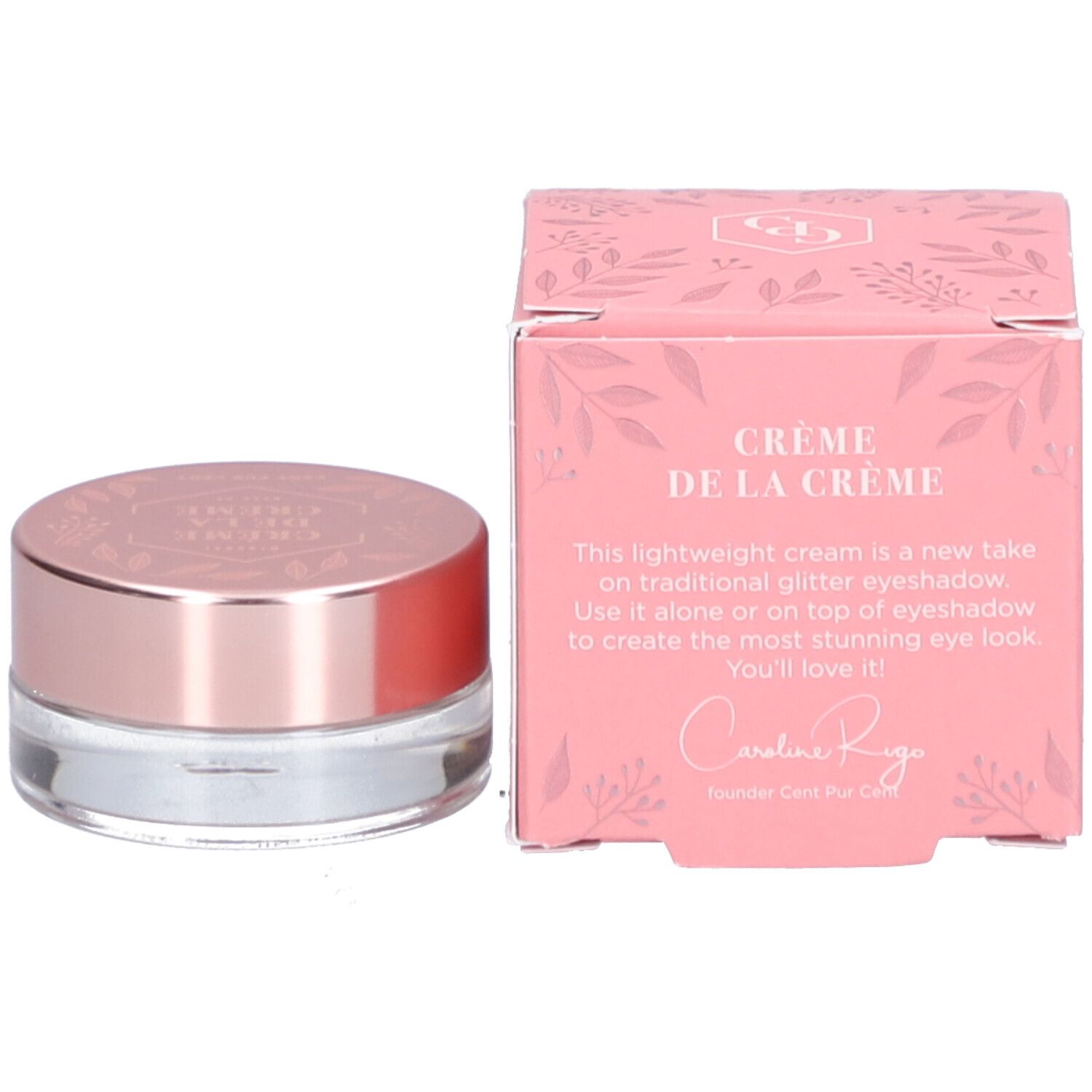 Boîte et pot roses. "Crème de la Crème" est écrit sur la boîte. Le pot a un couvercle rose. Texte: Caroline Rigo.