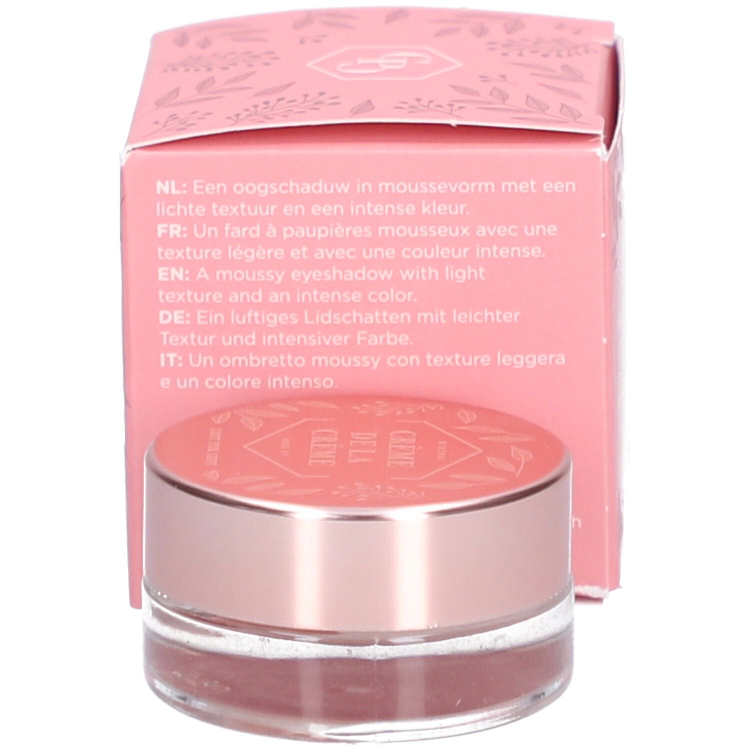 Boîte et pot roses. Texte multilingue sur la boîte. Le pot a un couvercle rose.