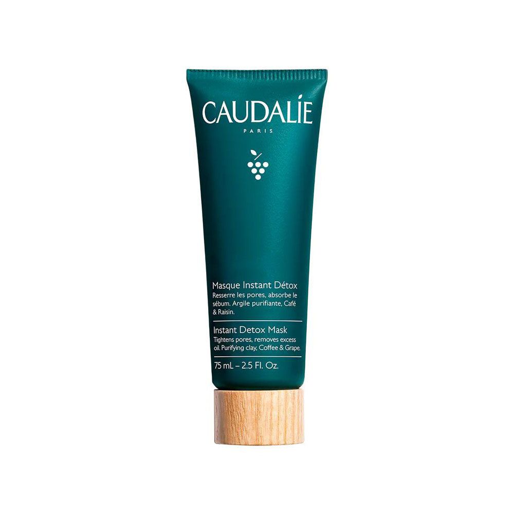 Donkergroene tube met witte tekst CAUDALIE PARIS. Productnaam: Masque Instant Détox. Druivenlogo. 75 ml. Met houten voet.