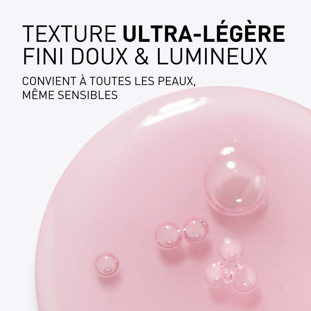 Texture du sérum. Liquide rose avec bulles. Informations textuelles en français.