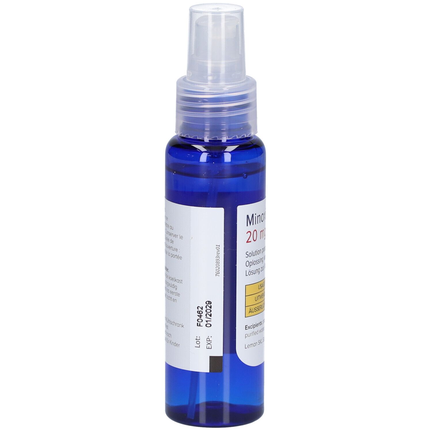 Flacon bleu avec vaporisateur. Étiquette avec informations. Inscription : Minoxidil Leman 20 mg/ml. Expiration 01/2029.