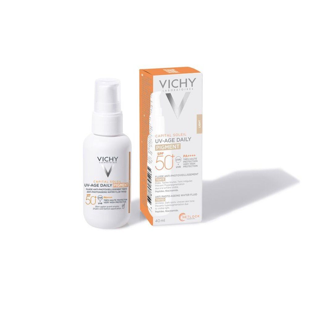 Produit et emballage. Flacon blanc et carton. Inscription: Vichy, Capital Soleil UV-Age Daily Pigment, SPF 50+.