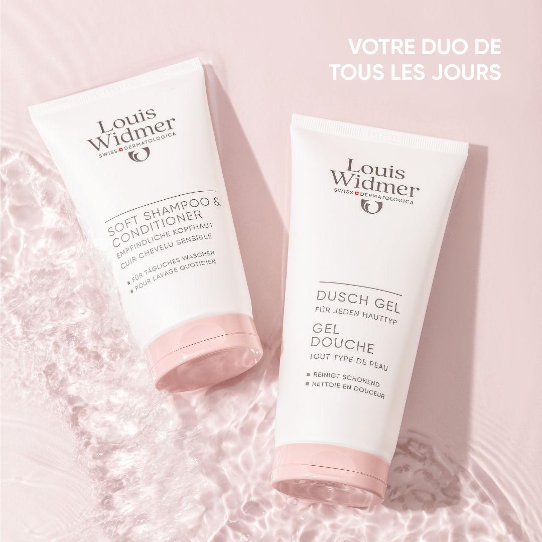 Deux tubes. Louis Widmer Soft Shampoo & Conditioner et gel douche. Fond rose.