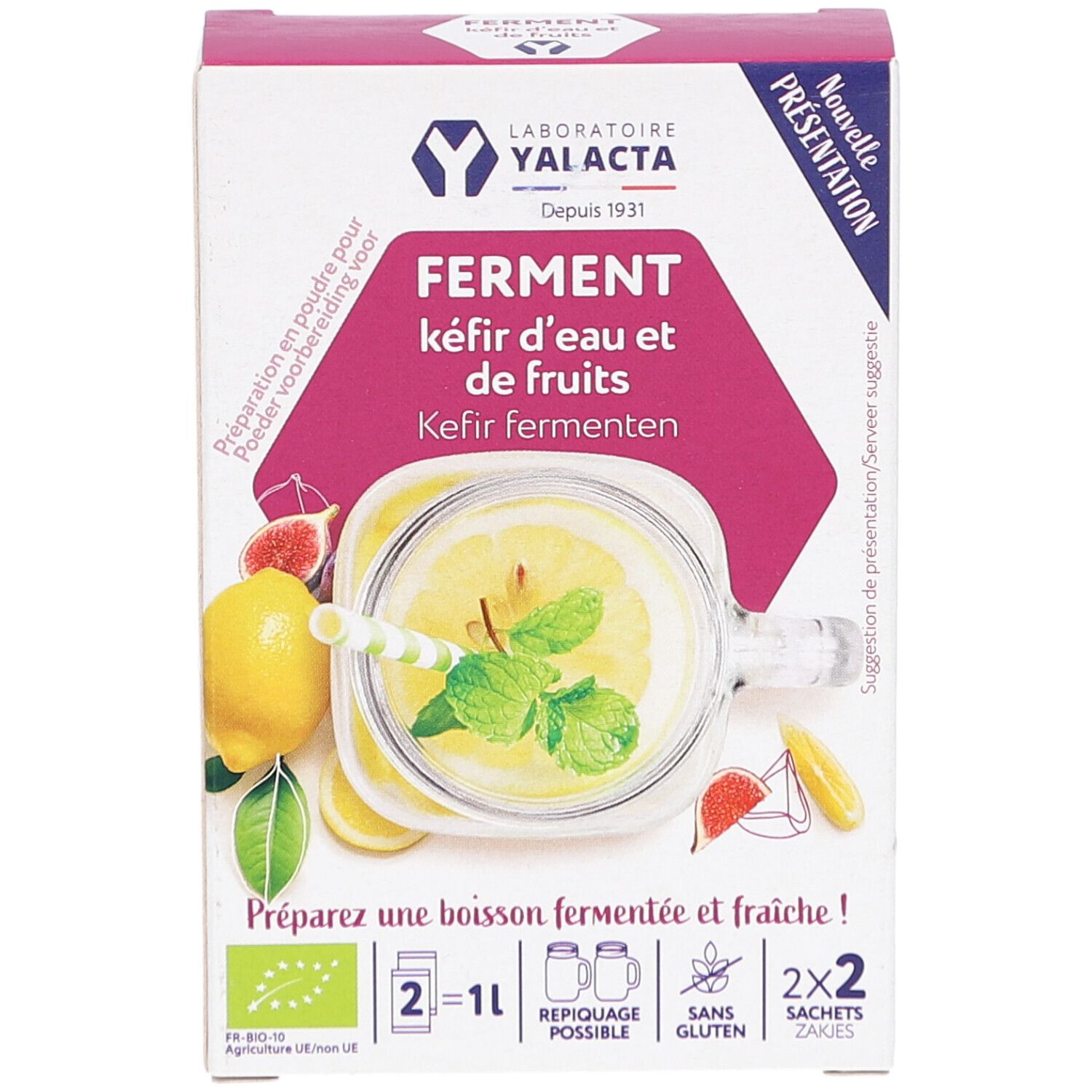 Kartonnen verpakking met productafbeelding. Opschrift: FERMENT kéfir d'eau et de fruits. Illustratie van drank met citroen en munt.