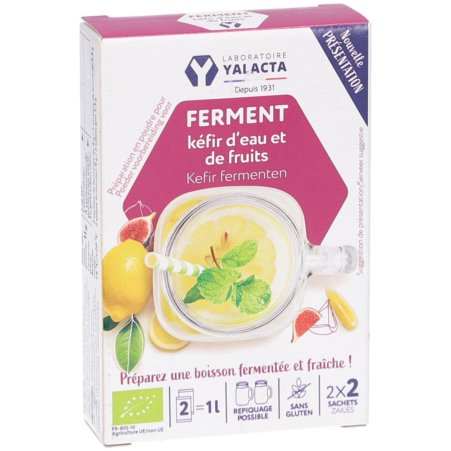 Kartonnen verpakking met productafbeelding. Opschrift: FERMENT kéfir d'eau et de fruits. Illustratie van drank met citroen en munt.