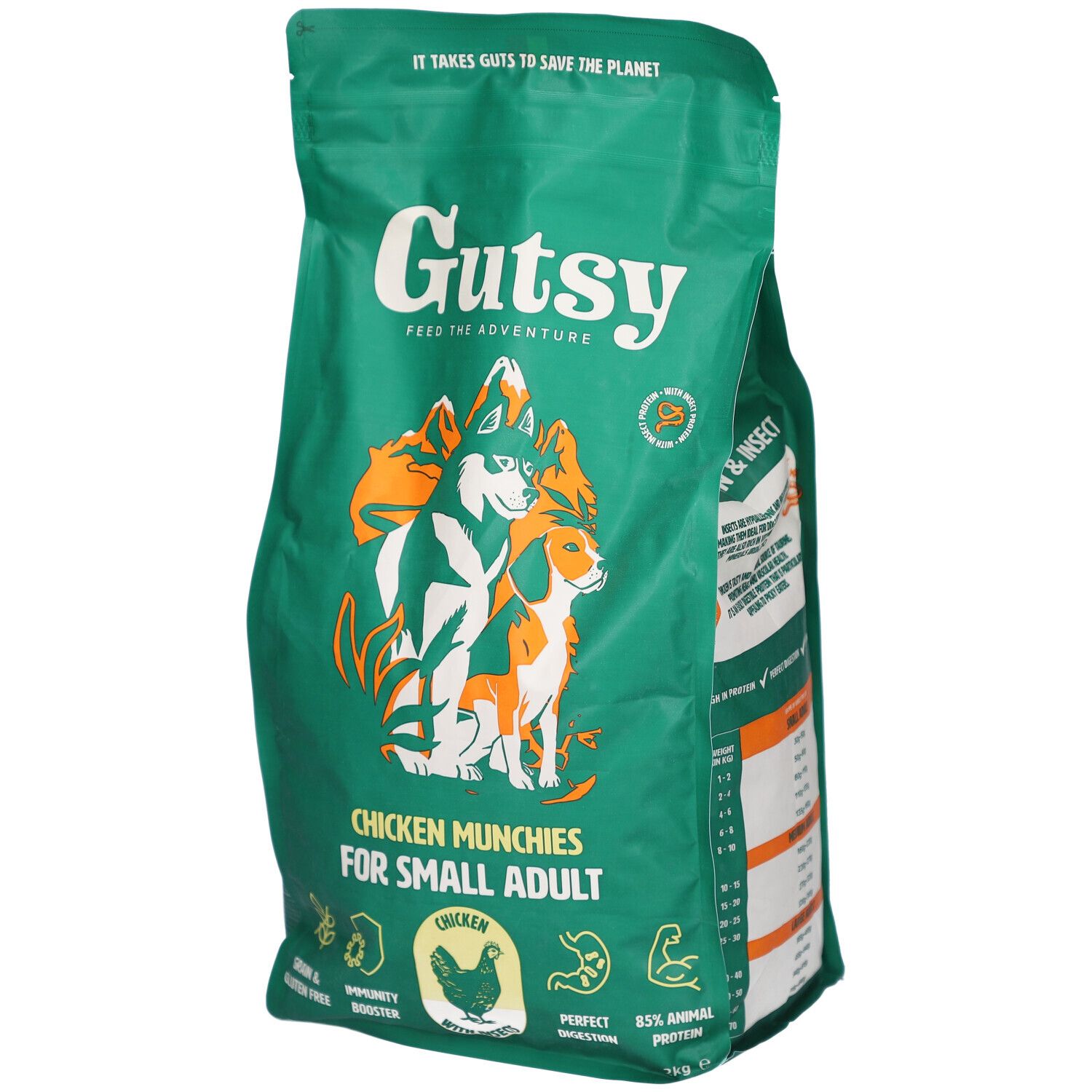 Sac vert Gutsy Chicken Munchies pour petits chiens adultes. Illustration de chiens et montagnes. Texte: Grain & Gluten Free.