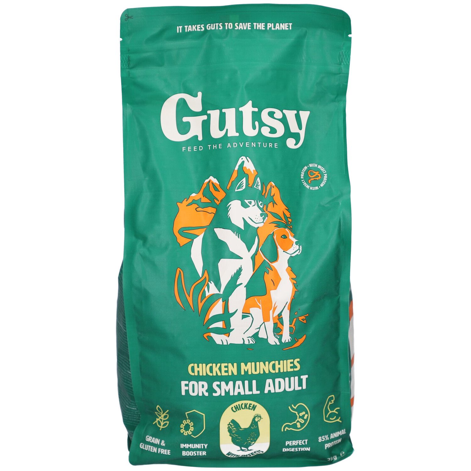 Sac vert Gutsy Chicken Munchies pour petits chiens adultes. Illustration de chiens et montagnes. Texte: Grain & Gluten Free.