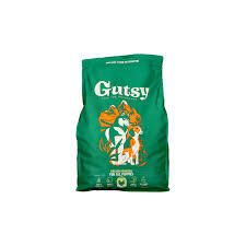 Groene zak met witte tekst "Gutsy". Illustratie van hond en pup. Tekst: "FOR PUPPIES". 