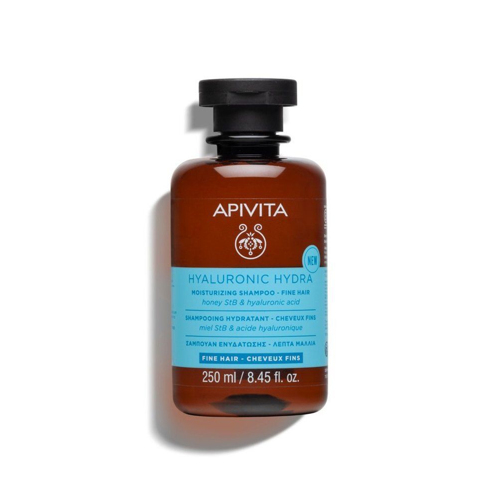 Flacon marron, bouchon noir. Inscription: Apivita Hyaluronic Hydra, cheveux fins. 250 ml.