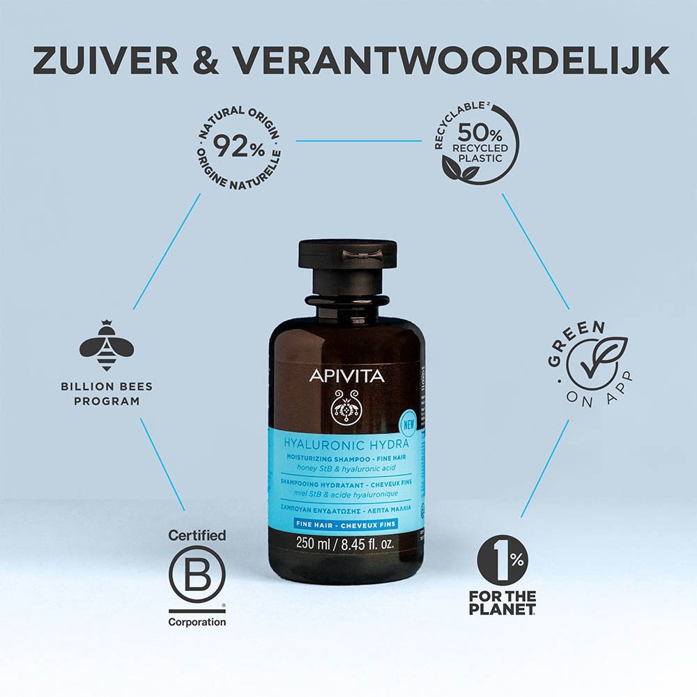 Apivita Hyaluronic Hydra Shampoo fles met zegels: Natuurlijke oorsprong, Billion Bees Program, B Corp, 1% for the Planet.