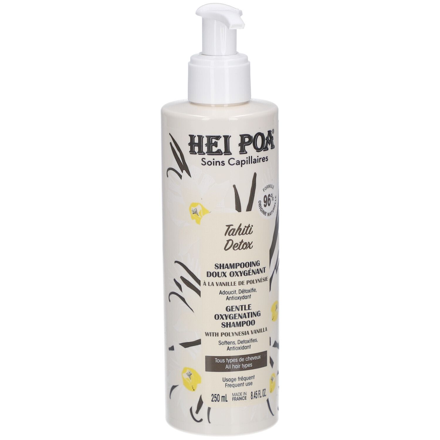 Flacon beige avec pompe. Inscription: Hei Poa, Tahiti Detox, Shampooing. À la vanille. 250 ml.