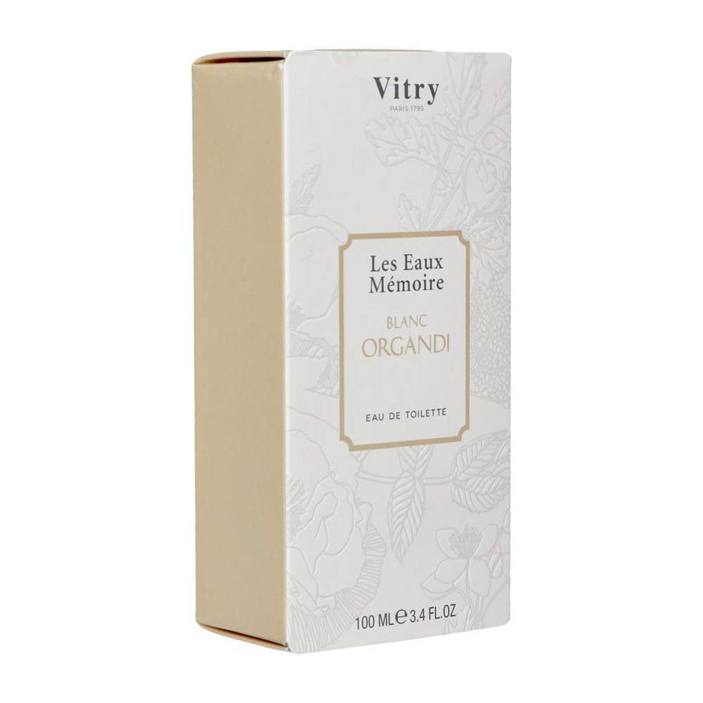 Boîte de parfum blanche, motif floral. Texte: Les Eaux Mémoire Blanc Organdi Eau de Toilette. Marque Vitry.