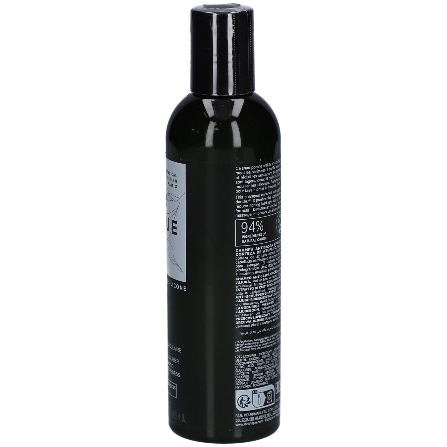 Flacon vert avec bouchon noir. Texte au dos. Logo vegan et autres informations.