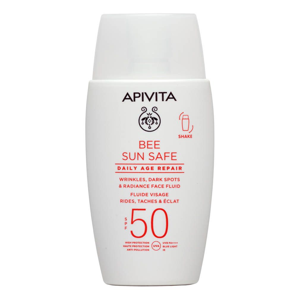 Witte fles zonnebrand. Merk: Apivita Bee Sun Safe. SPF 50. Dop en opschrift.