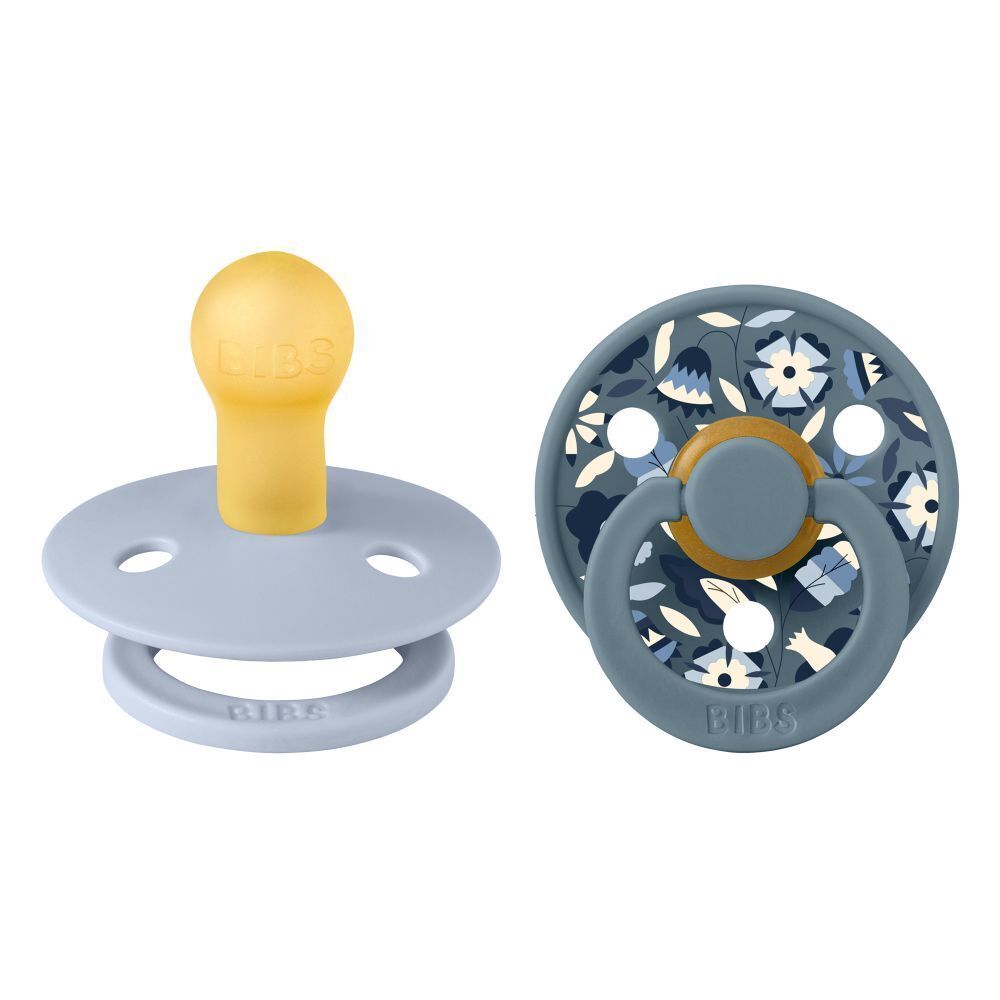 Twee fopspenen. Blauw, geel. Ronde vorm. BIBS-logo. Bloemenpatroon. 0-6 maanden.