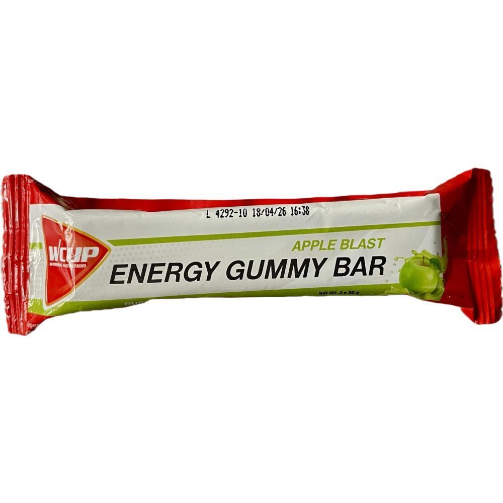 Verpakte reep. Tekst: WCUP, Energy Gummy Bar, Apple Blast. Rode en witte verpakking met groene accenten. Appel illustratie.