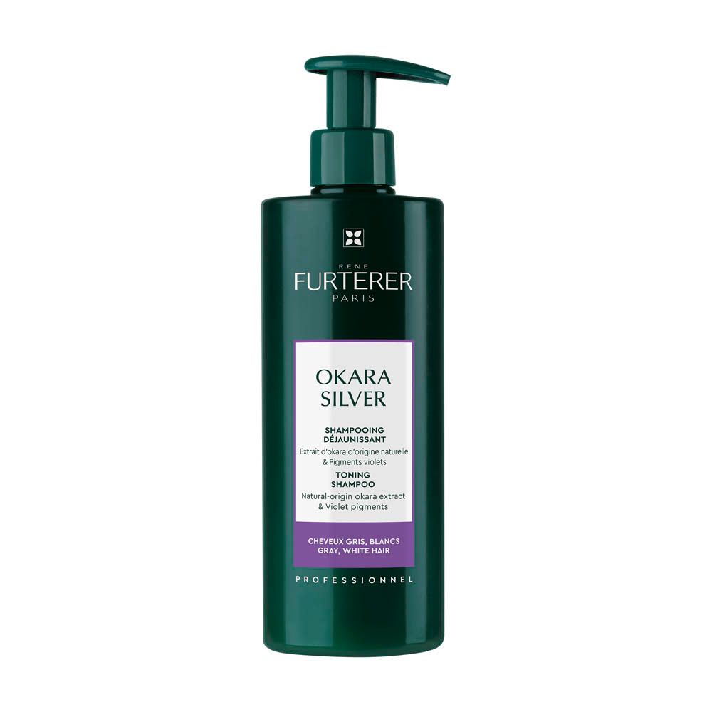 Groene fles met pomp. Opschrift: René Furterer Paris, Okara Silver Shampooing Déjaunissant. Voor grijs, wit haar.